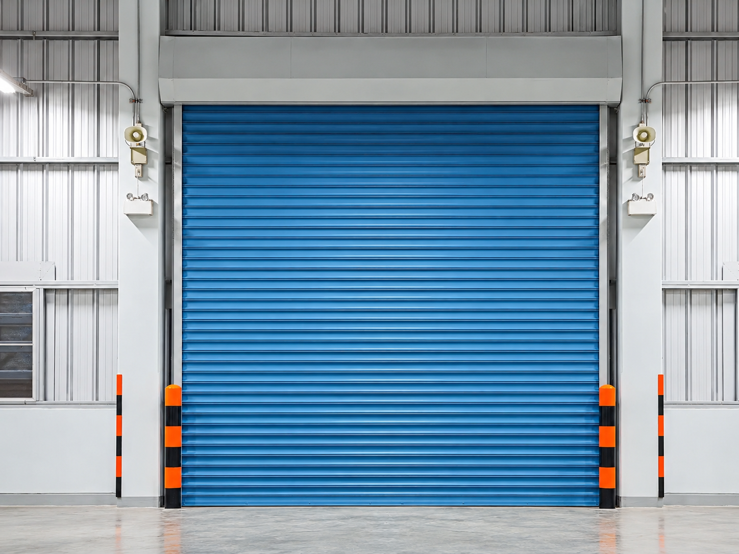 Galvalume rolling shutter motorised drive and control installation — operational view